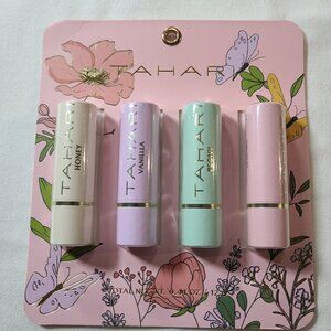 New TAHARI Moisturizing Soothing 4 Piece Flavored Lip Balm Set - A007